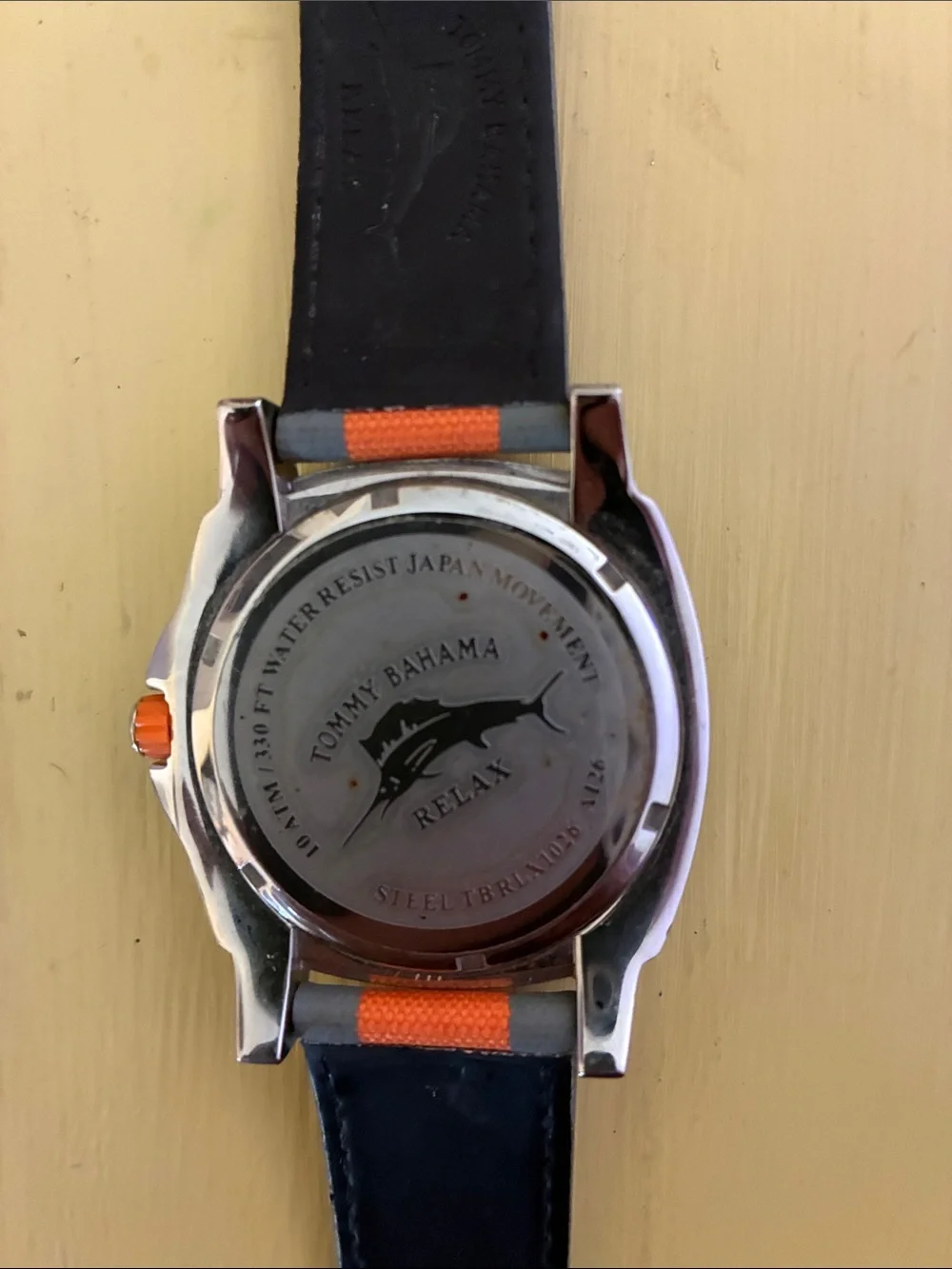 Tommy BAHAMA Orange and Gray Sport Watch with Canvas Strap. Water resistant